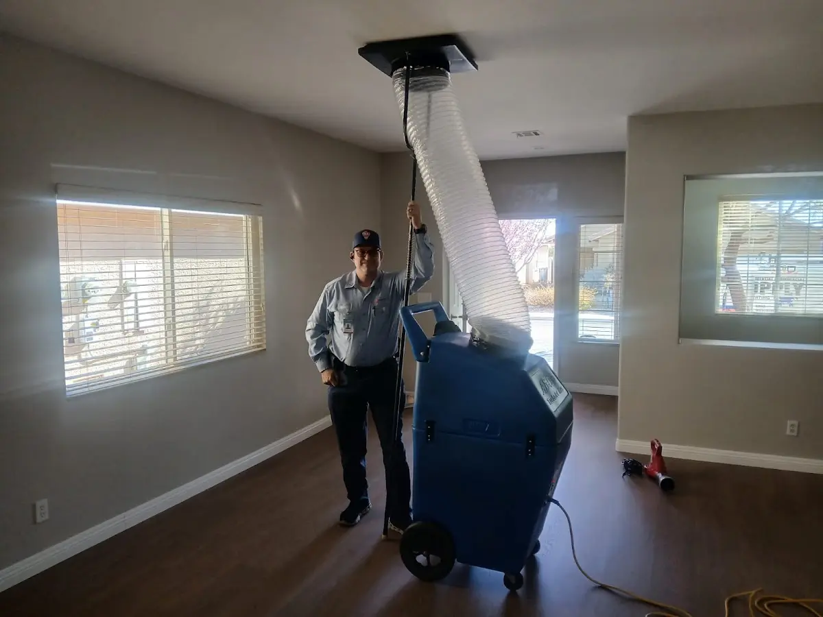 Professional Dryer Vent Cleaning work inside a Tipp City home